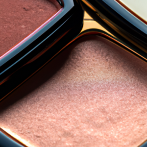 A close-up of a bronzing powder compact with various shades of color.