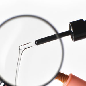 A close-up image of a tube of an eyelash growth serum with a magnifying glass over it.