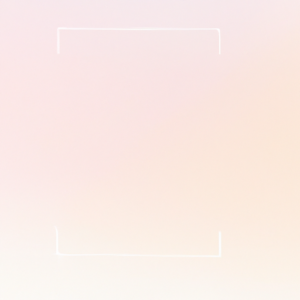 Soft pink and gold pastel colors creating a gradient with a camera in the center.